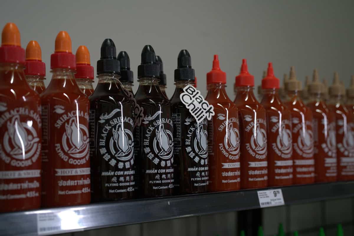 Bottles of Sriracha hot chilli sauce